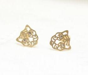 Cut-out Tiger Stud earrings detailed with cubic zirconia in gold